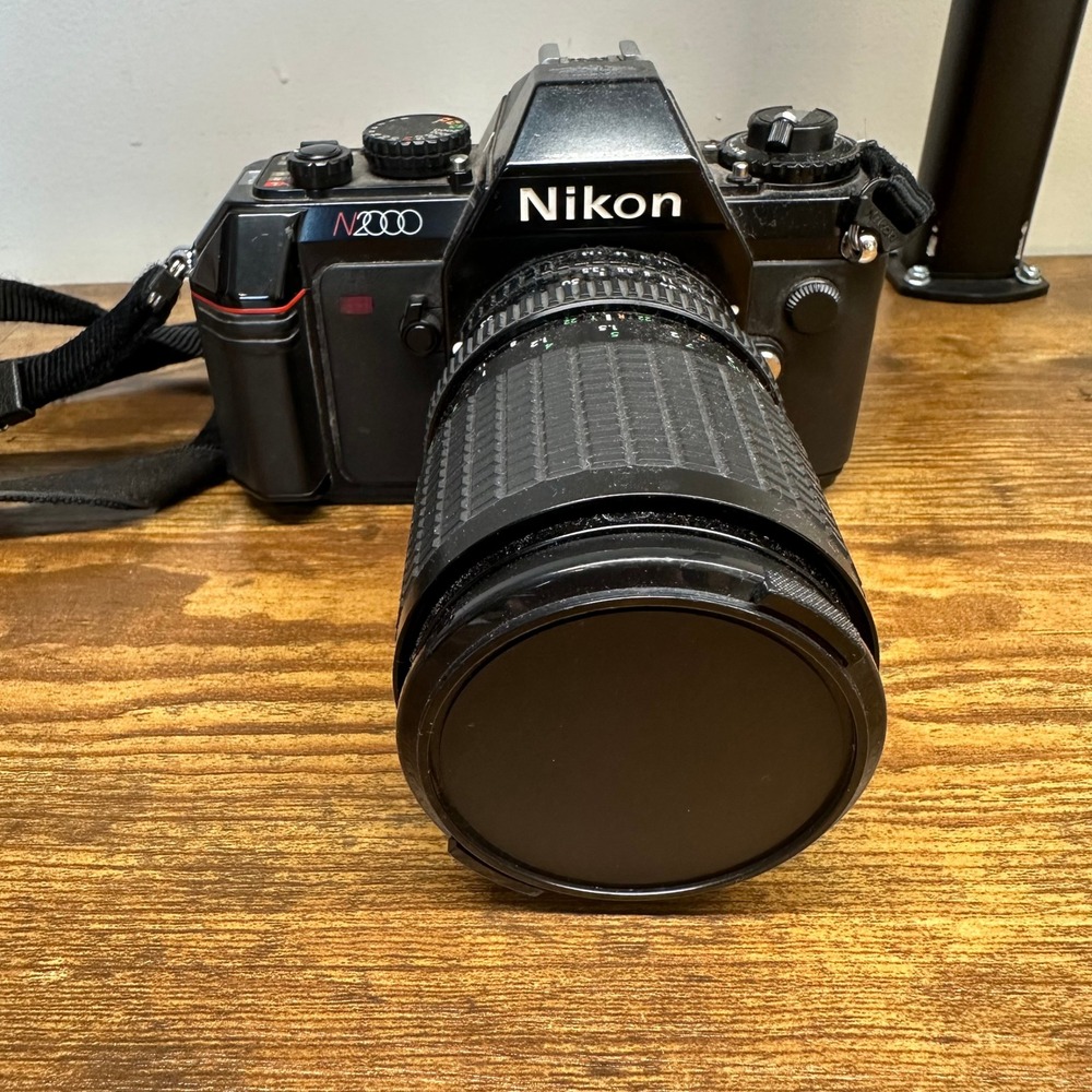 Nikon N2000 35mm SLR Film Camera with Sigma 28-84mm Lens and MB-3 Grip READ